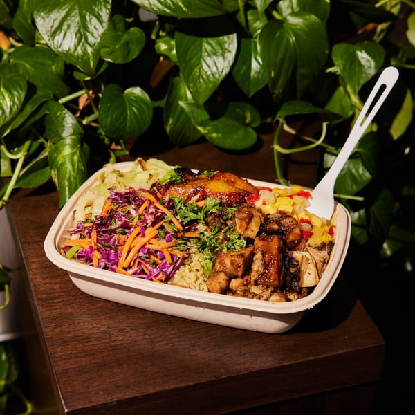 Jrk! Jamaican jerk chicken bowl with rice, plantains, slaw, and mango salsa.